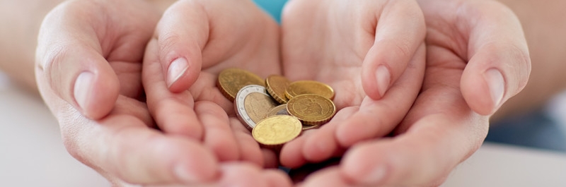 H�nde mit M�nzen